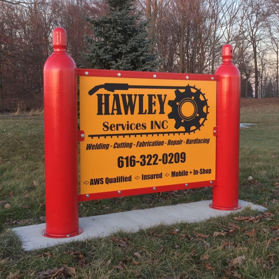 The Hawley Services Inc. shop sign in Sand Lake, Michigan