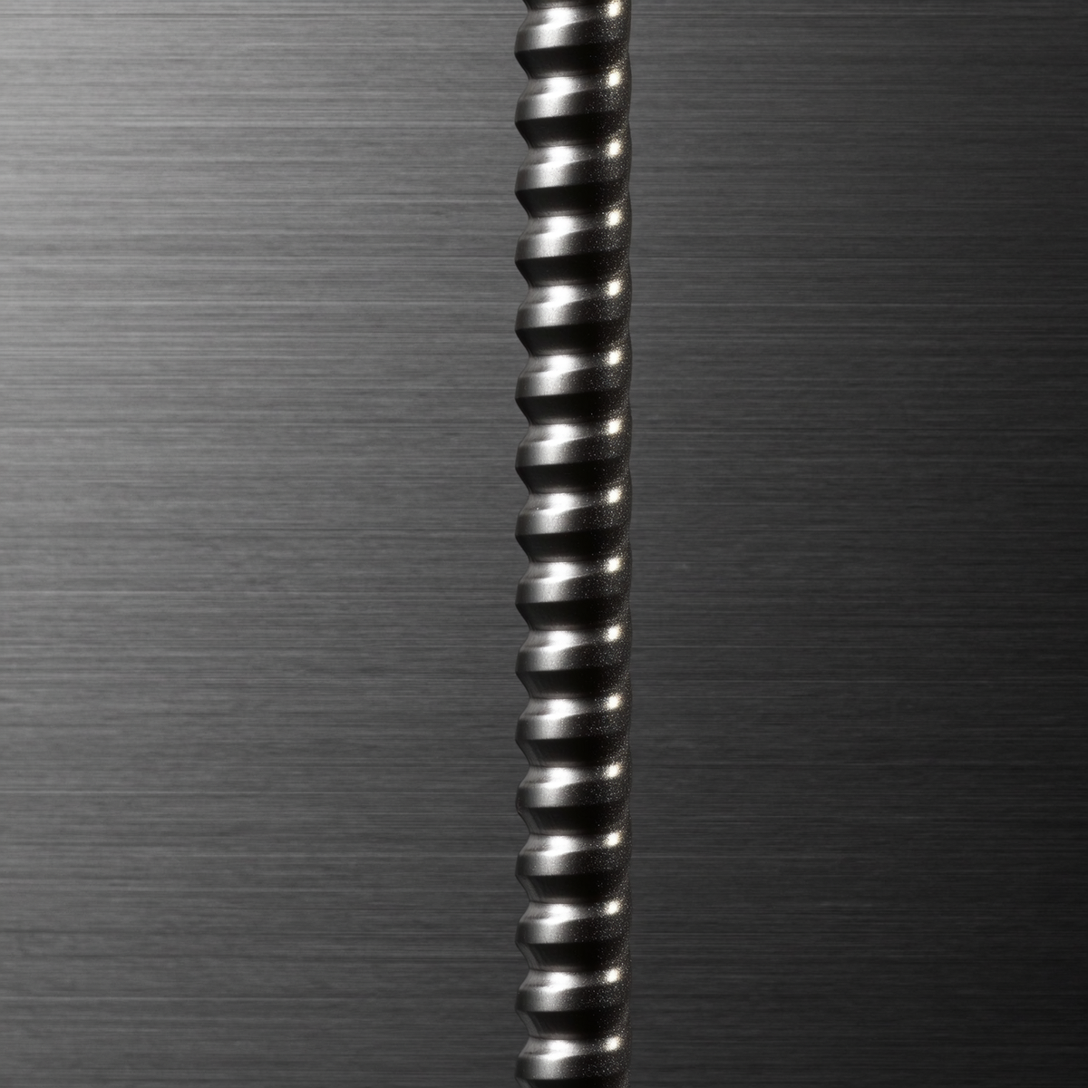 Close-up clean steel weld seam on fabricated part